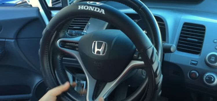 how to unlock steering wheel honda